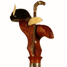 Tirolés hat in ebony, handle in coral wood, lioness in silver